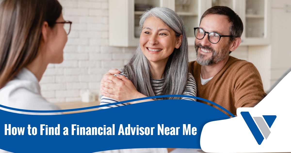 A man sits and smiles with his arm around his wife as she smiles at their financial advisor.