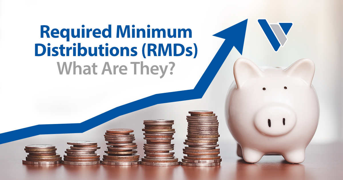 Image of a savings piggy bank beside stacked coins on a wooden table, featuring Virtus Wealth Management and highlighting Required Minimum Distributions (RMDs) and what they are.