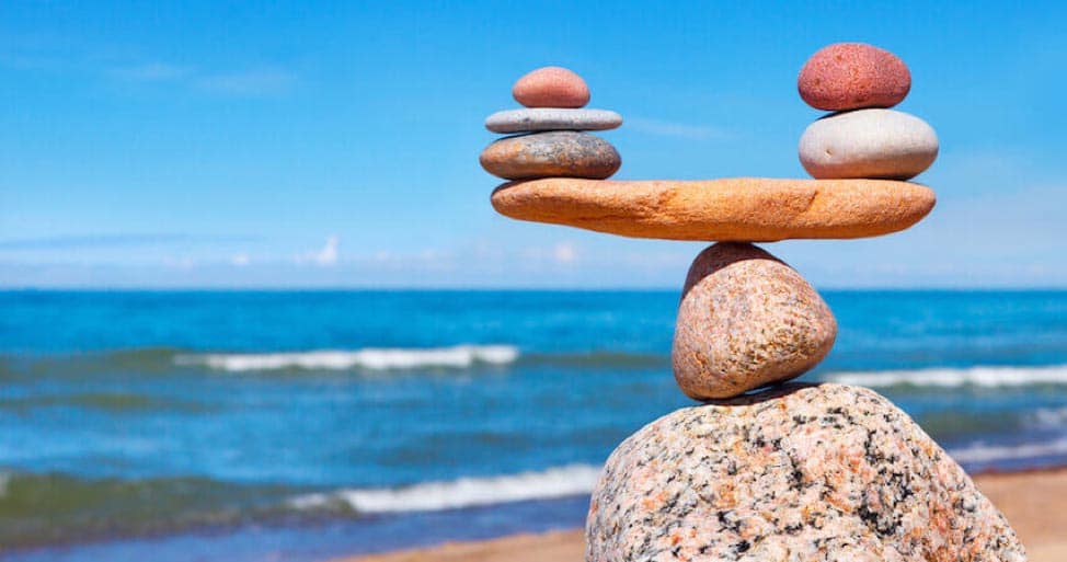 Stack of balanced stones on a beach
