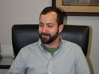 Photo of Josh Hubman in Southlake, Texas offices of Virtus Wealth financial advisors